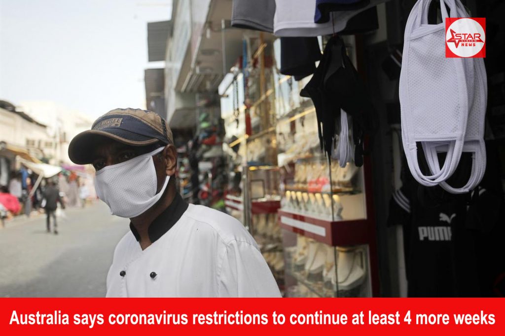 Australia says coronavirus restrictions to continue at least 4 more weeks