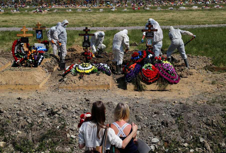 Russia announces virus deaths exceed 10,000