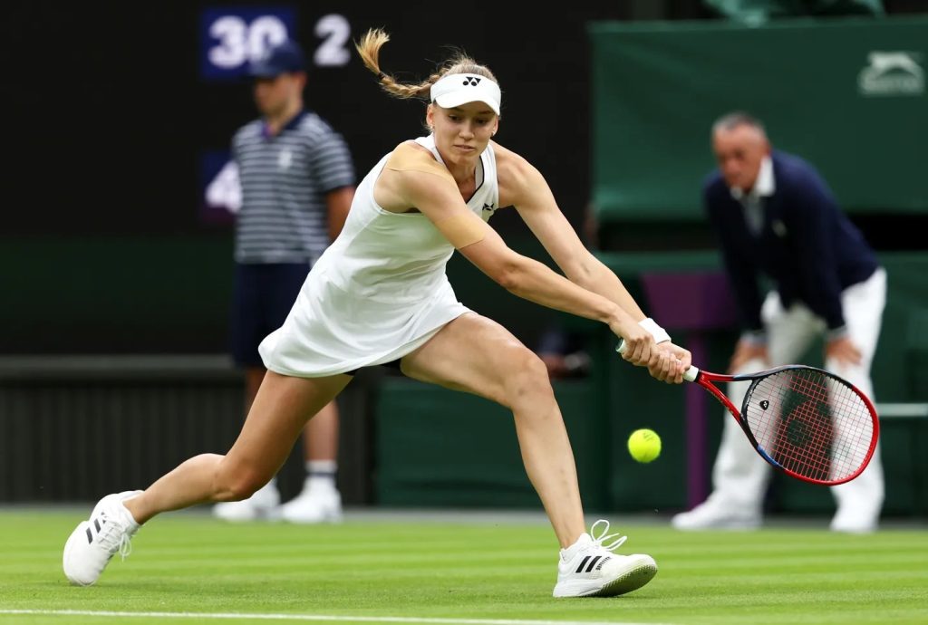 wimbledon:-rybakina,-jabeur-advance-in-contrasting-styles-on-another-rain-hit-day-(women’s-roundup)