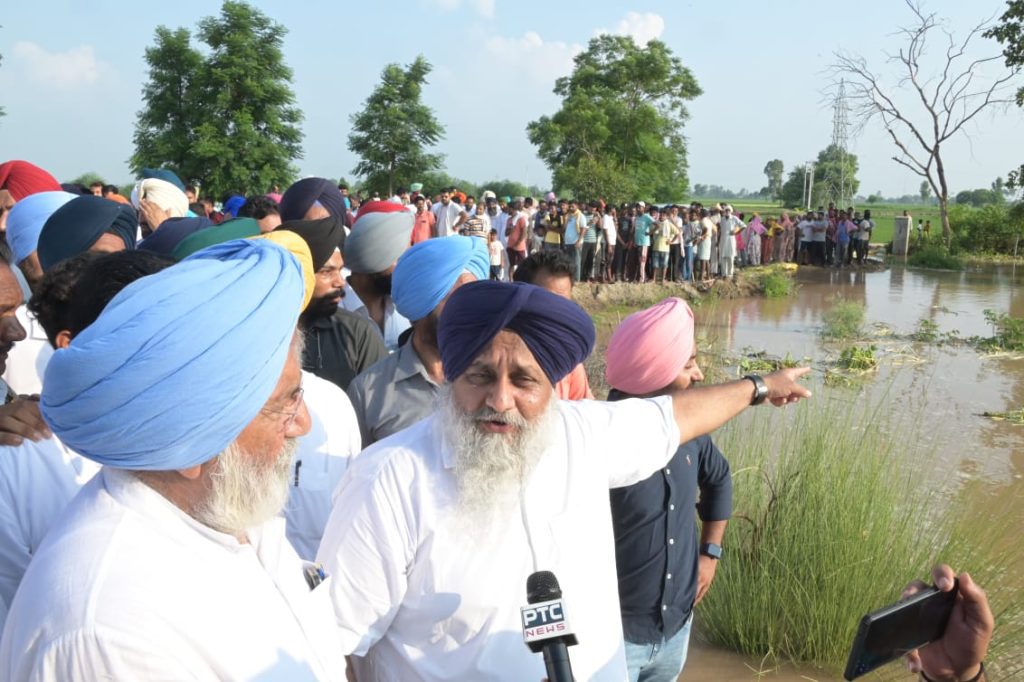 sukhbir-badal-visits-flood-hit-villages-along-pakistan-border,-blames-govt-for-releasing-water