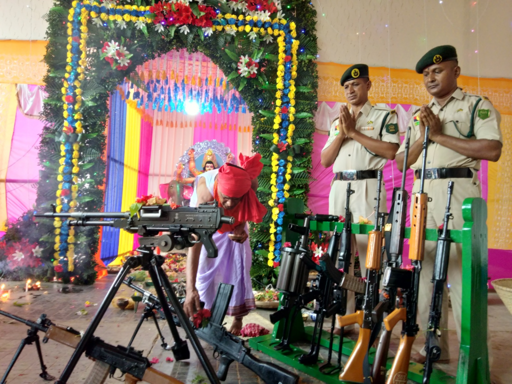 Guns and roses: Tripura State Rifles’ bravehearts worship arms on Vishwakarma Puja guns-and-roses:-tripura-state-rifles’-bravehearts-worship-arms-on-vishwakarma-puja
