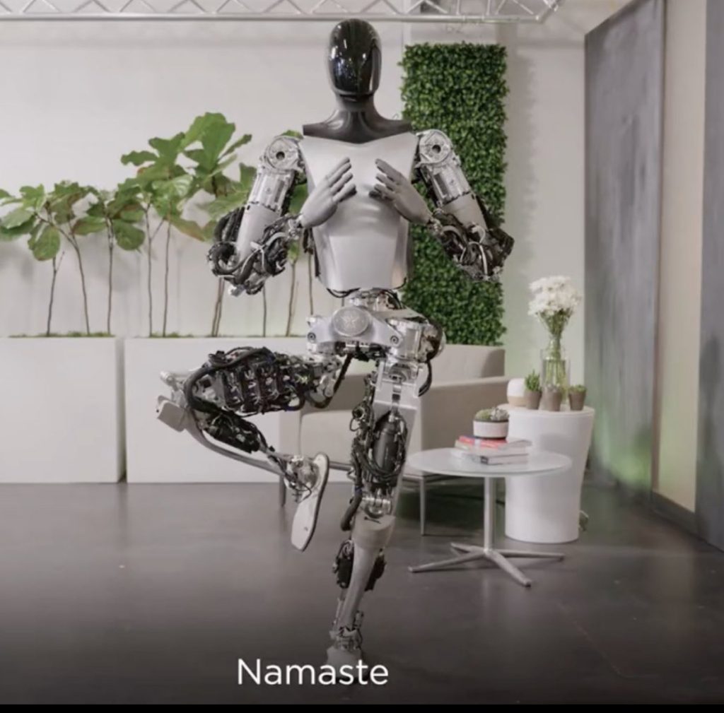 musk-showcases-tesla-humanoid-robot-performing-yoga,-namaste